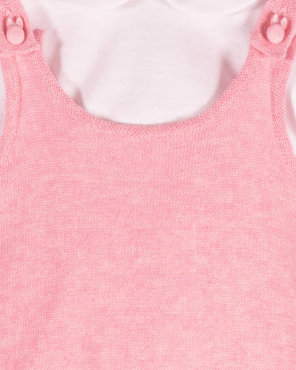 Close-up of Aspen Candy Mélange pink overall strap showing French Bunny button and knit texture