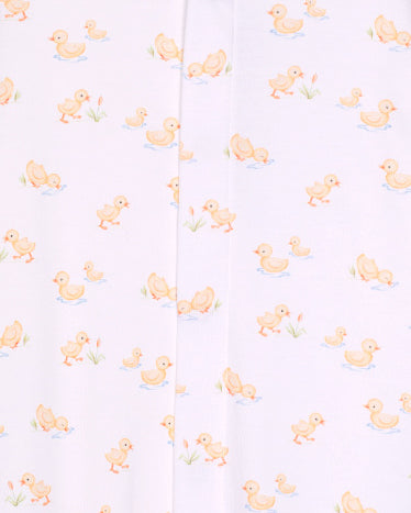 Pattern of yellow ducklings on a light purple background