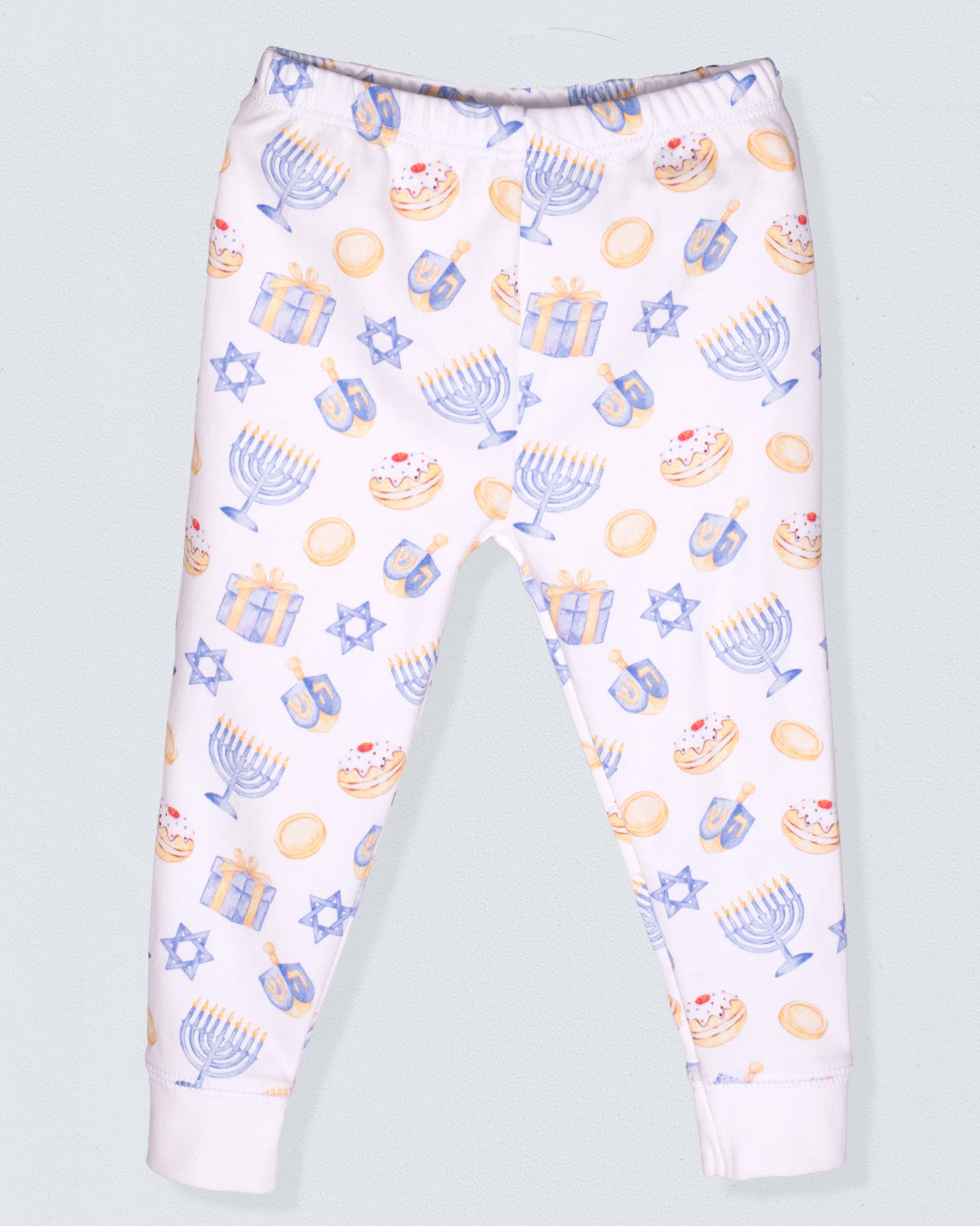 Children's pajama pants with Hanukkah-themed pattern on a light gray background