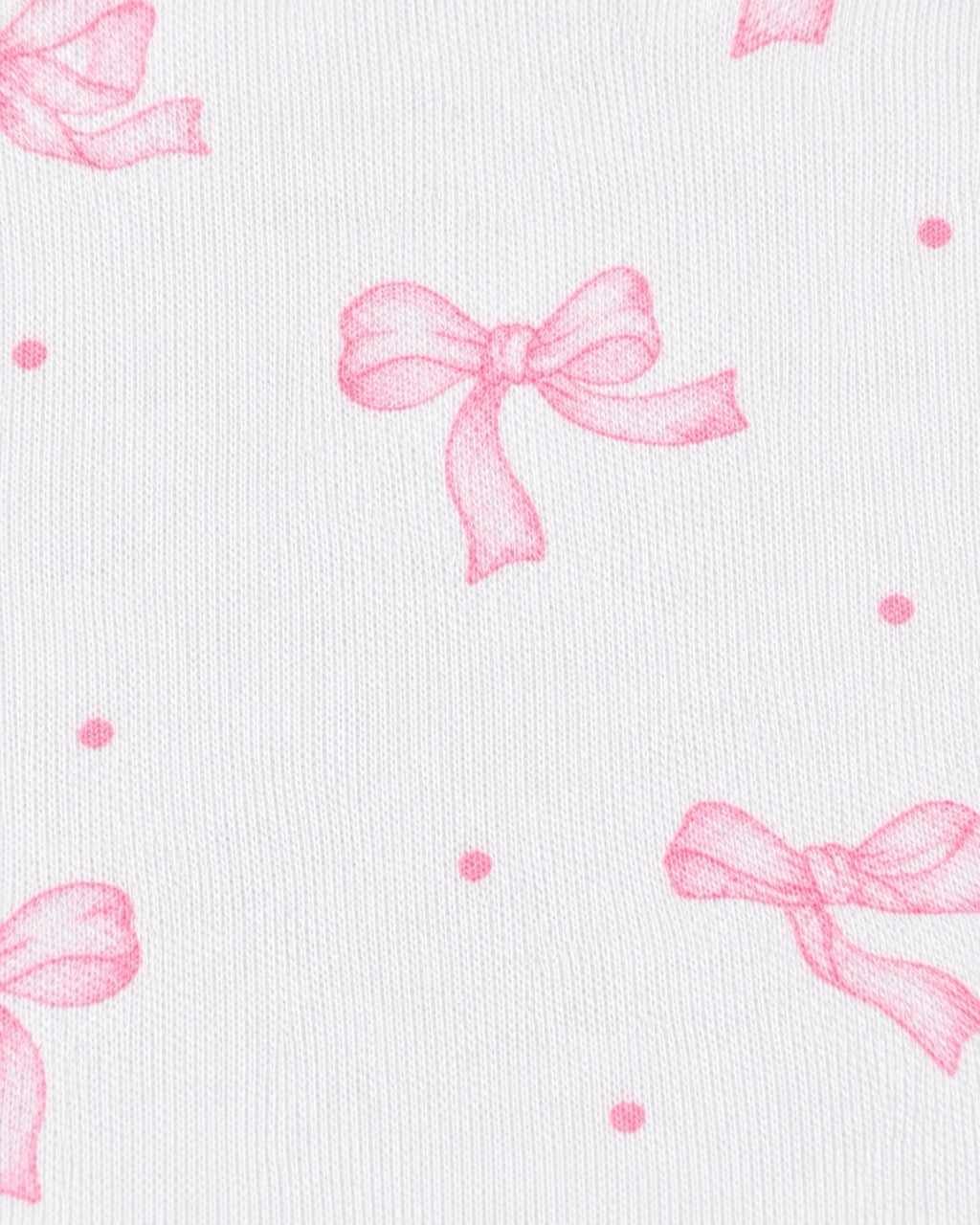 White textured fabric with a repeating pattern of light pink bows and small pink polka dots.
