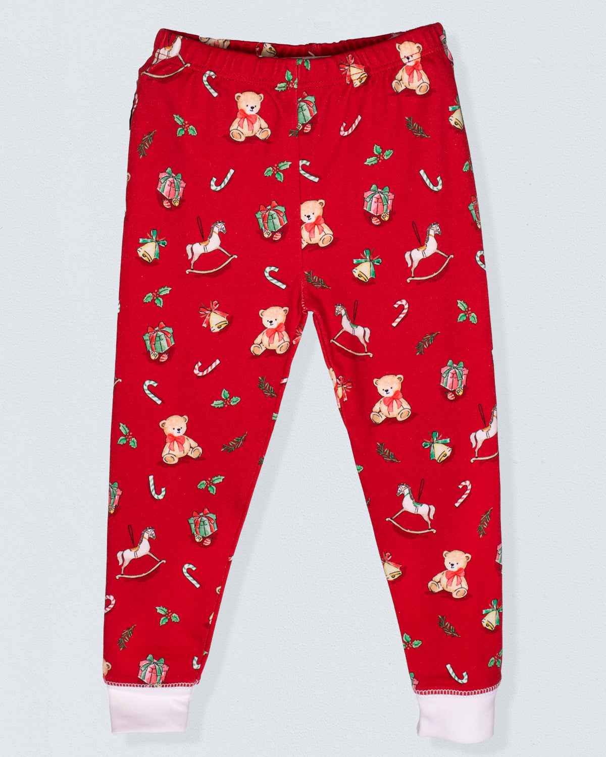 Red pajama pants with teddy bear and horse pattern on a white background