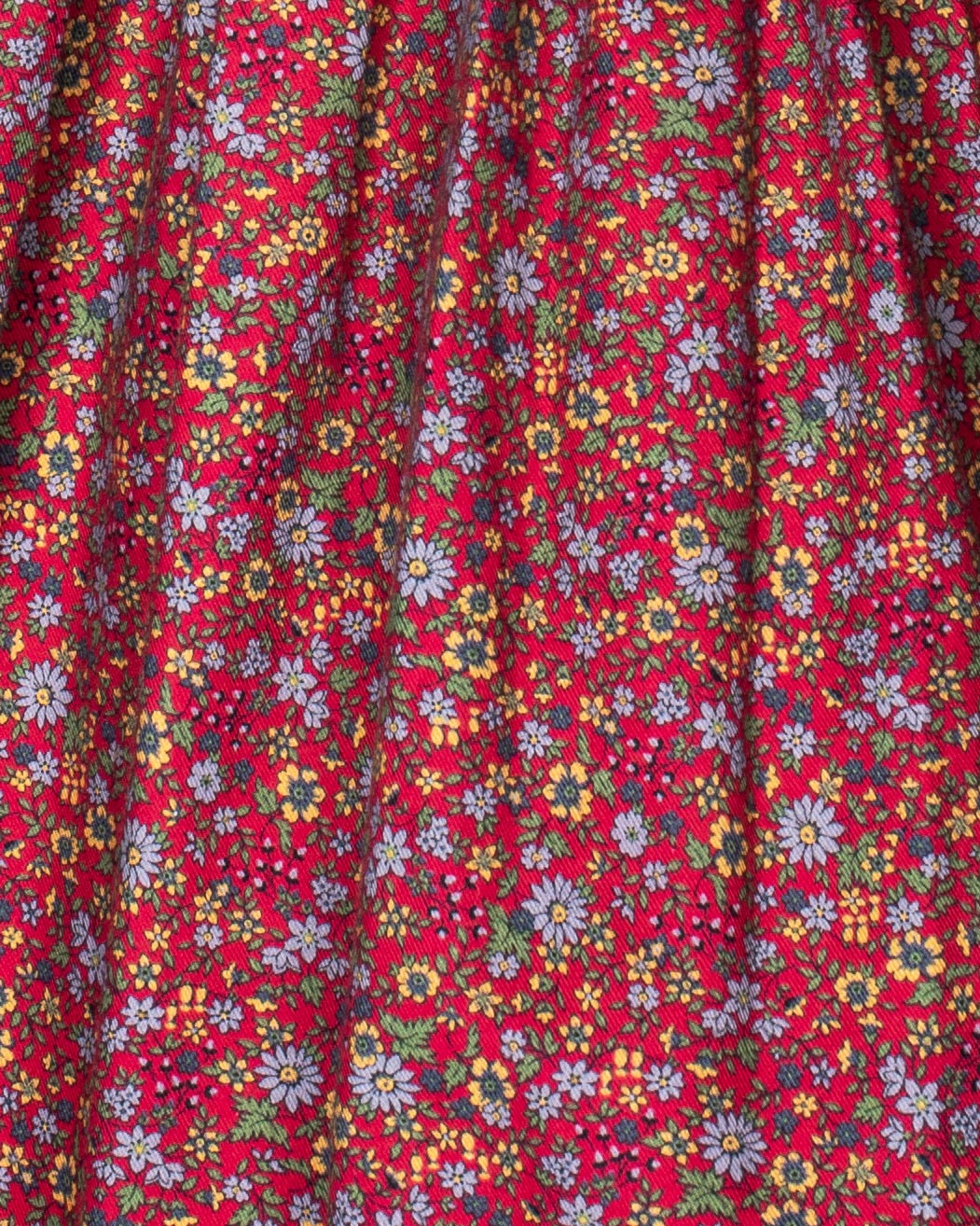 Red fabric with small floral pattern