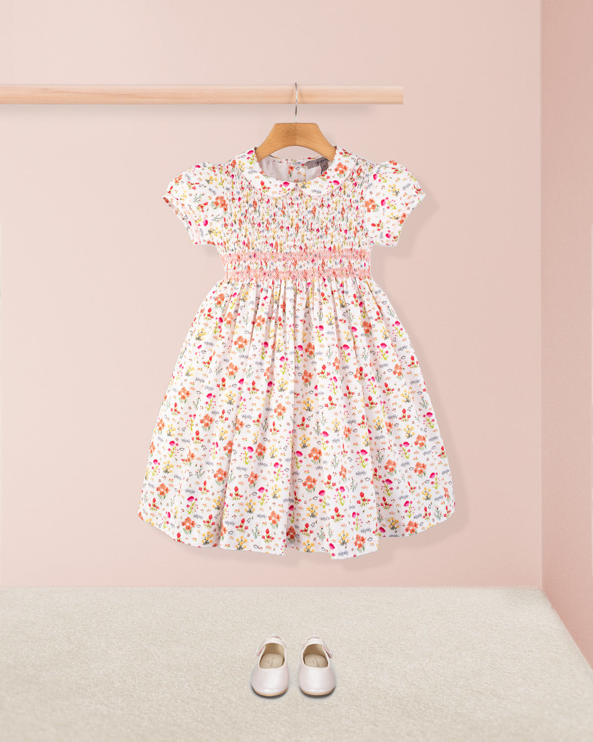 Amanda Happy Garden Smocked Dress styled with white shoes