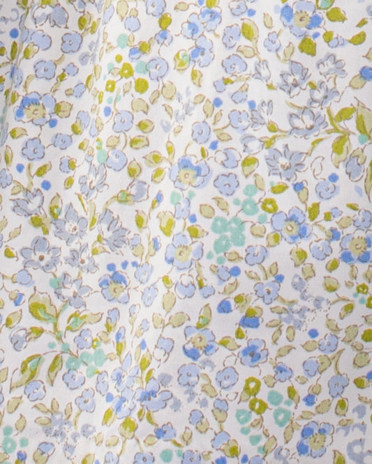 Close-up of floral fabric on Amanda Lauren Blue Floral Smocked Dress