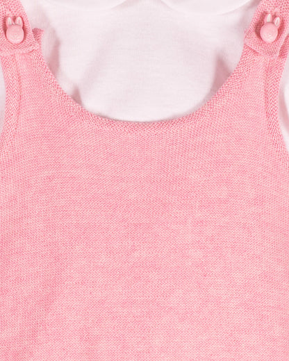 Close-up of Aspen Candy Mélange pink overall strap showing French Bunny button and knit texture