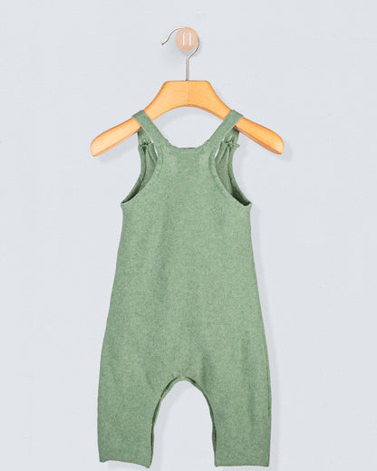 Back view of Aspen Sage Melange Cotton Knit Overall hanging on a wooden hanger