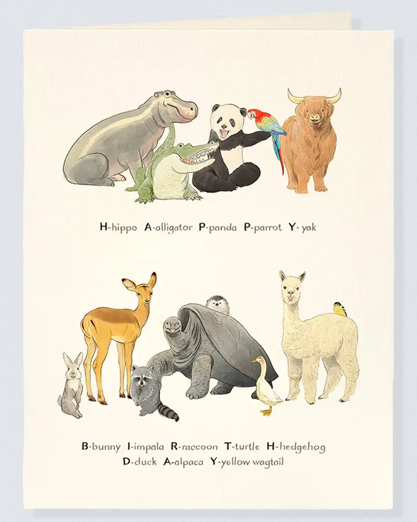 Front of Baby Animals Birthday Card featuring watercolor illustrations of baby animals arranged alphabetically including a hippo alligator panda parrot yak bunny impala tortoise alpaca duck and lemur on a cream background