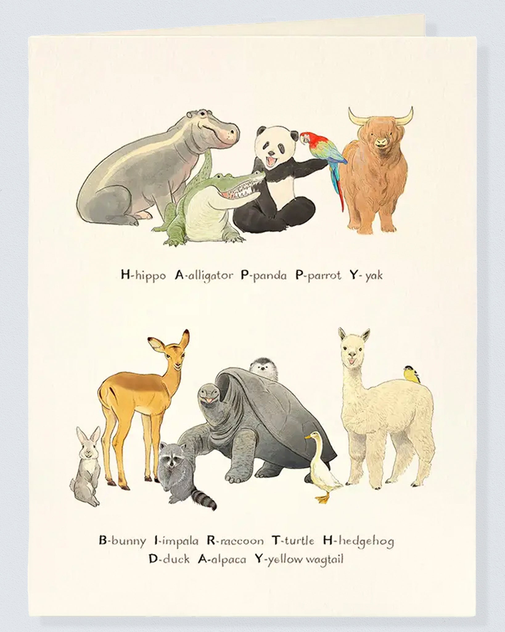 Front of Baby Animals Birthday Card featuring watercolor illustrations of baby animals arranged alphabetically including a hippo alligator panda parrot yak bunny impala tortoise alpaca duck and lemur on a cream background