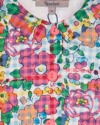 Floral patterned fabric with 'fleurisse' brand label on a white background