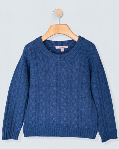 Blue sweater on a wooden hanger against a light gray background