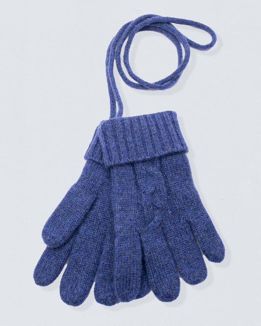 2 knitted blue gloves for children with a string connecting the gloves