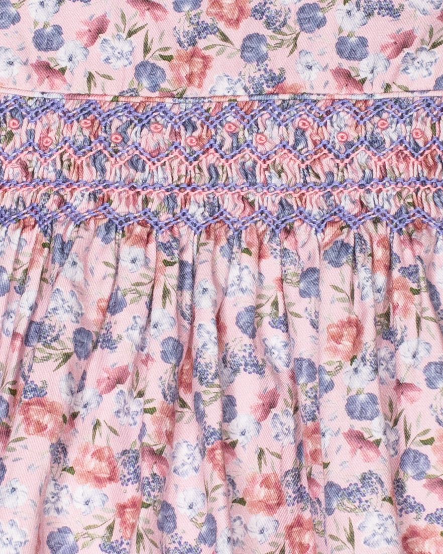 Floral patterned fabric with smocked waistband-closeup view