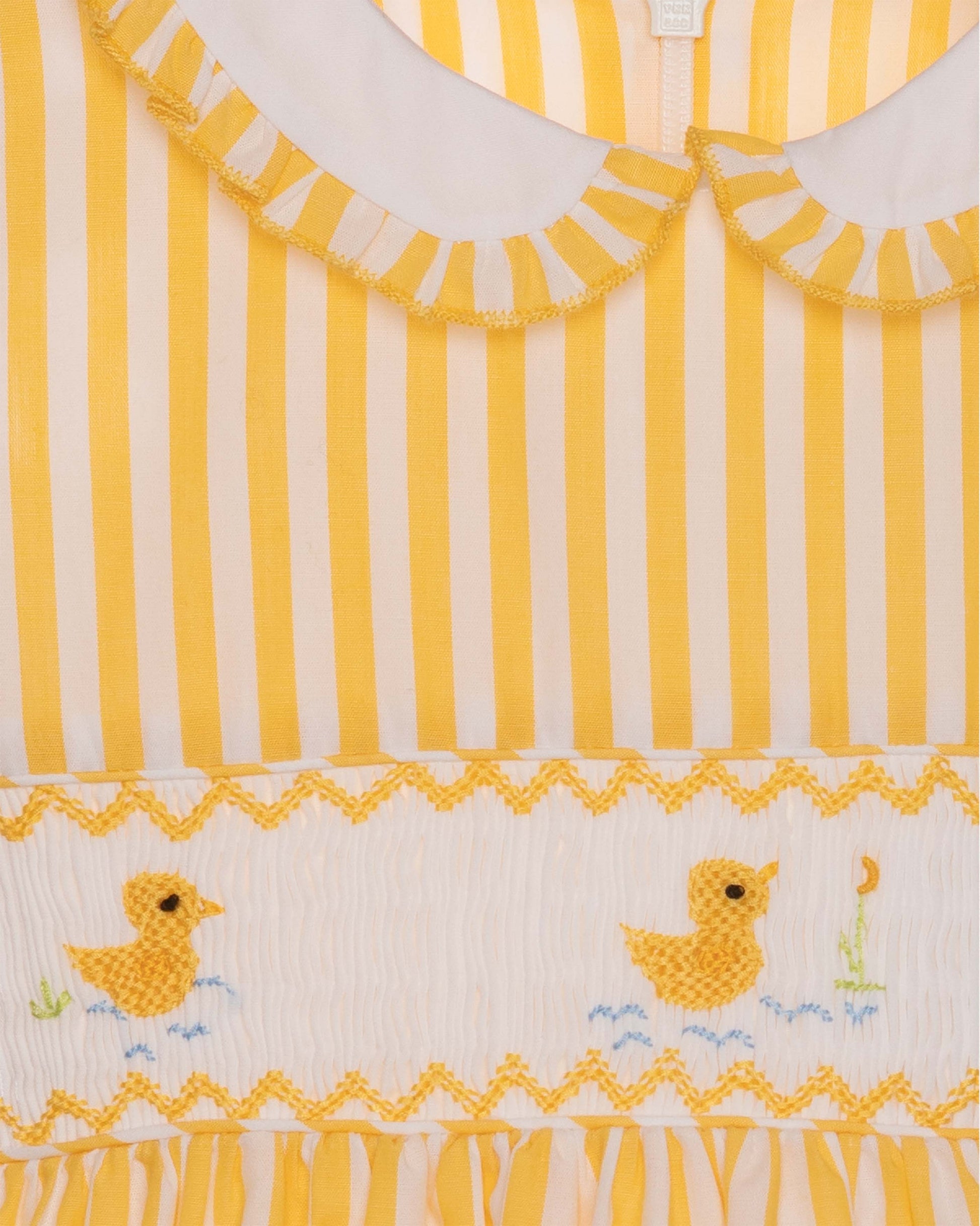 Yellow and white striped fabric with duck embroidery