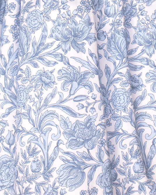 Floral patterned fabric with blue flowers on a white background