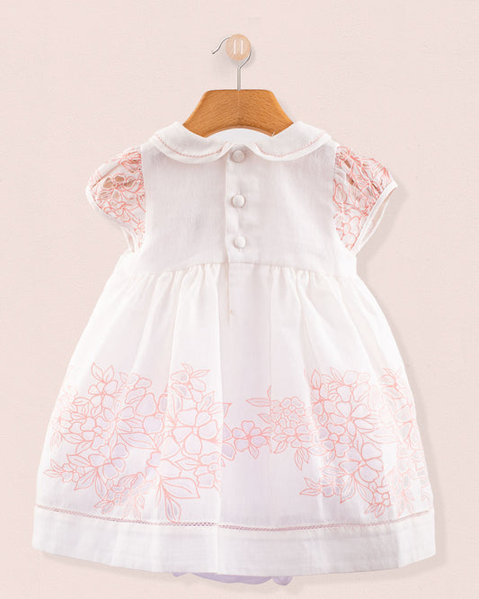 Back view of Baby Emmy Doppia Pink Smock Set highlighting pearl buttons and scalloped collar on white cotton