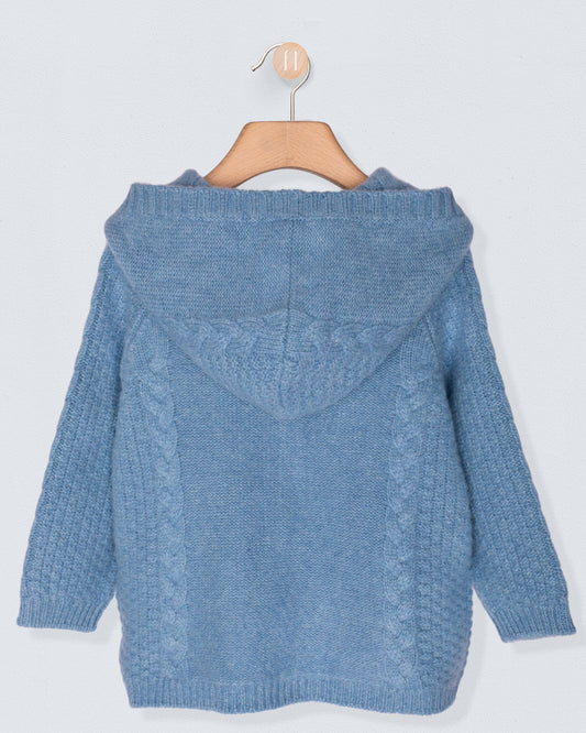 Back of Blue knitted hoodie on a wooden hanger against a light gray background