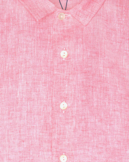 Close-up of a pink textured shirt with buttons