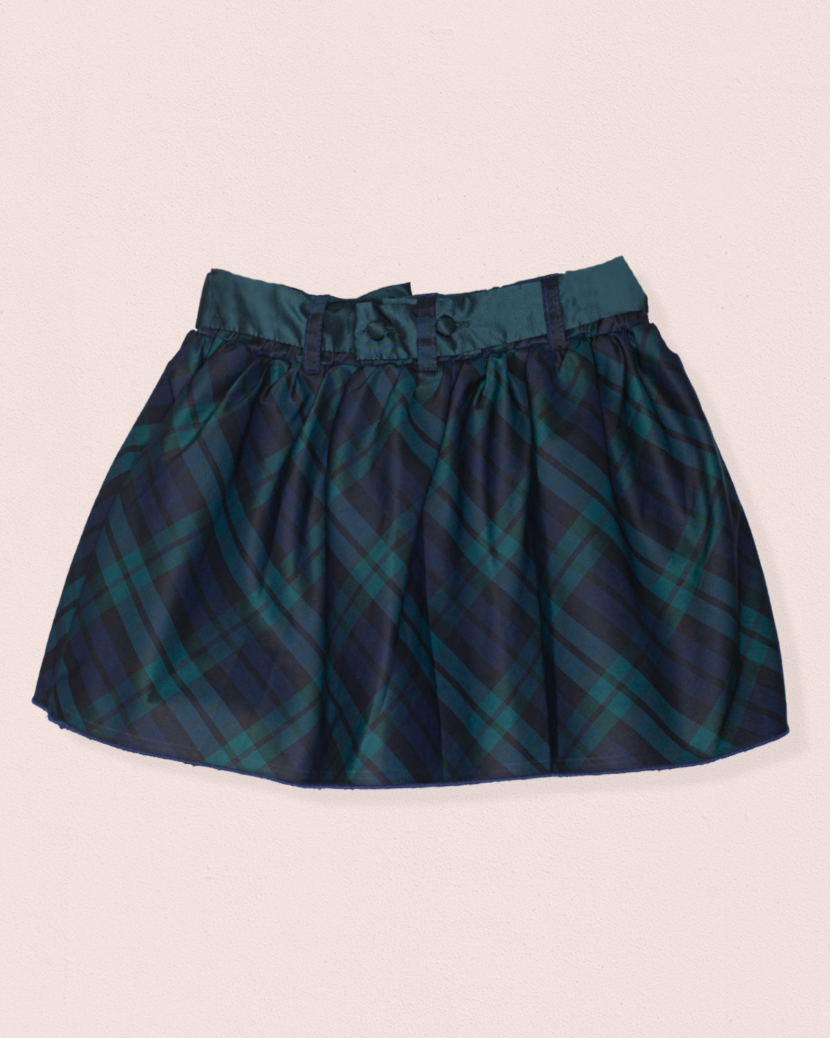 Back of a skirt with black watch design with green and black color