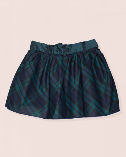 Back of a skirt with black watch design with green and black color