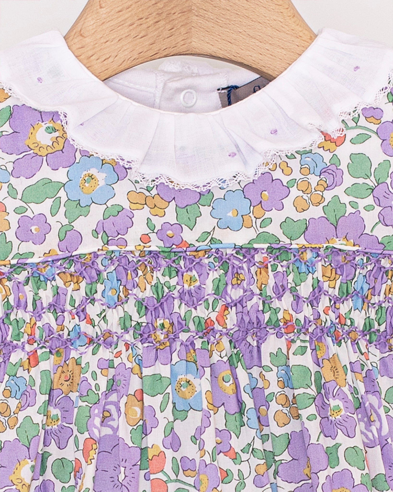 Ines Ruffle Onesie with Embroidered Lavender Dots - Onesie