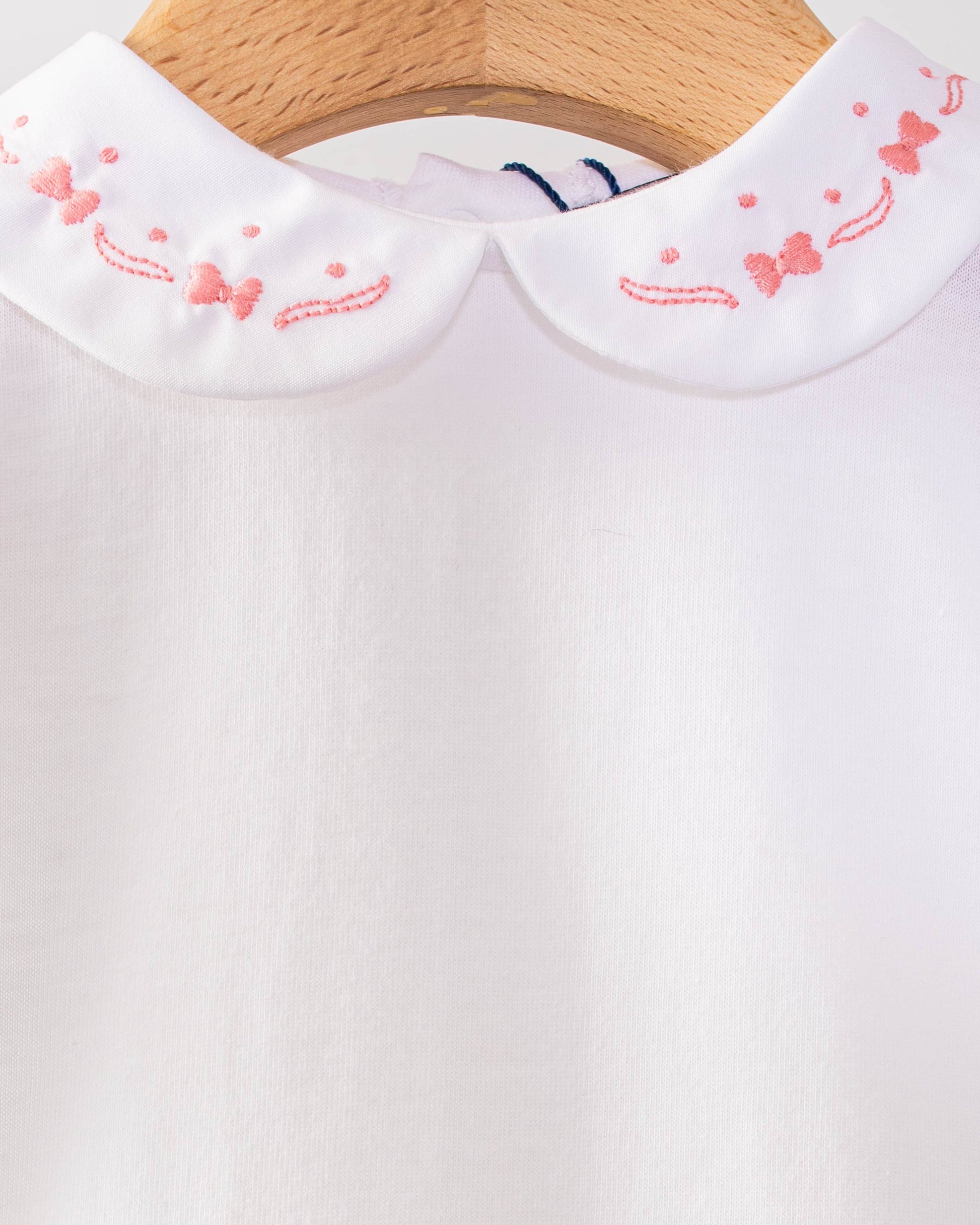 Ines Onesie with Embroidered Primrose Bows - Onesie