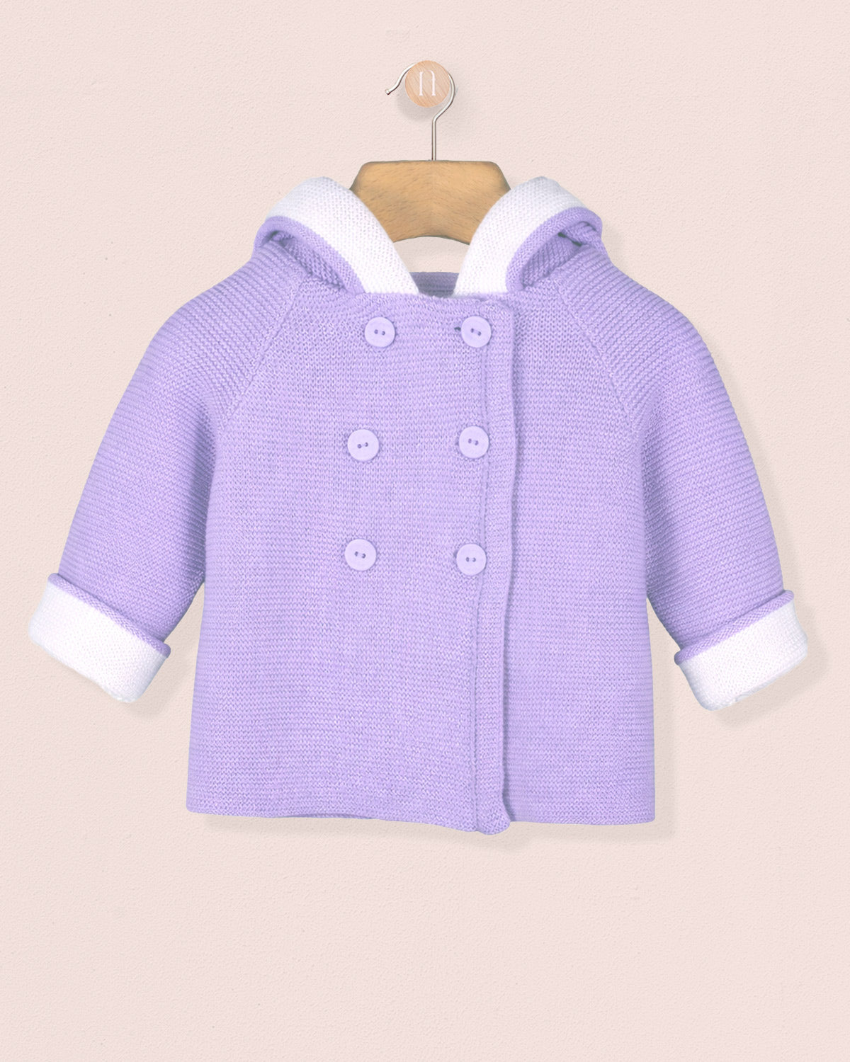 Purple baby coat with white trim on a beige background