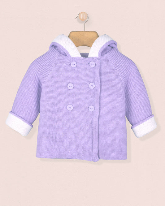 Purple baby coat with white trim on a beige background