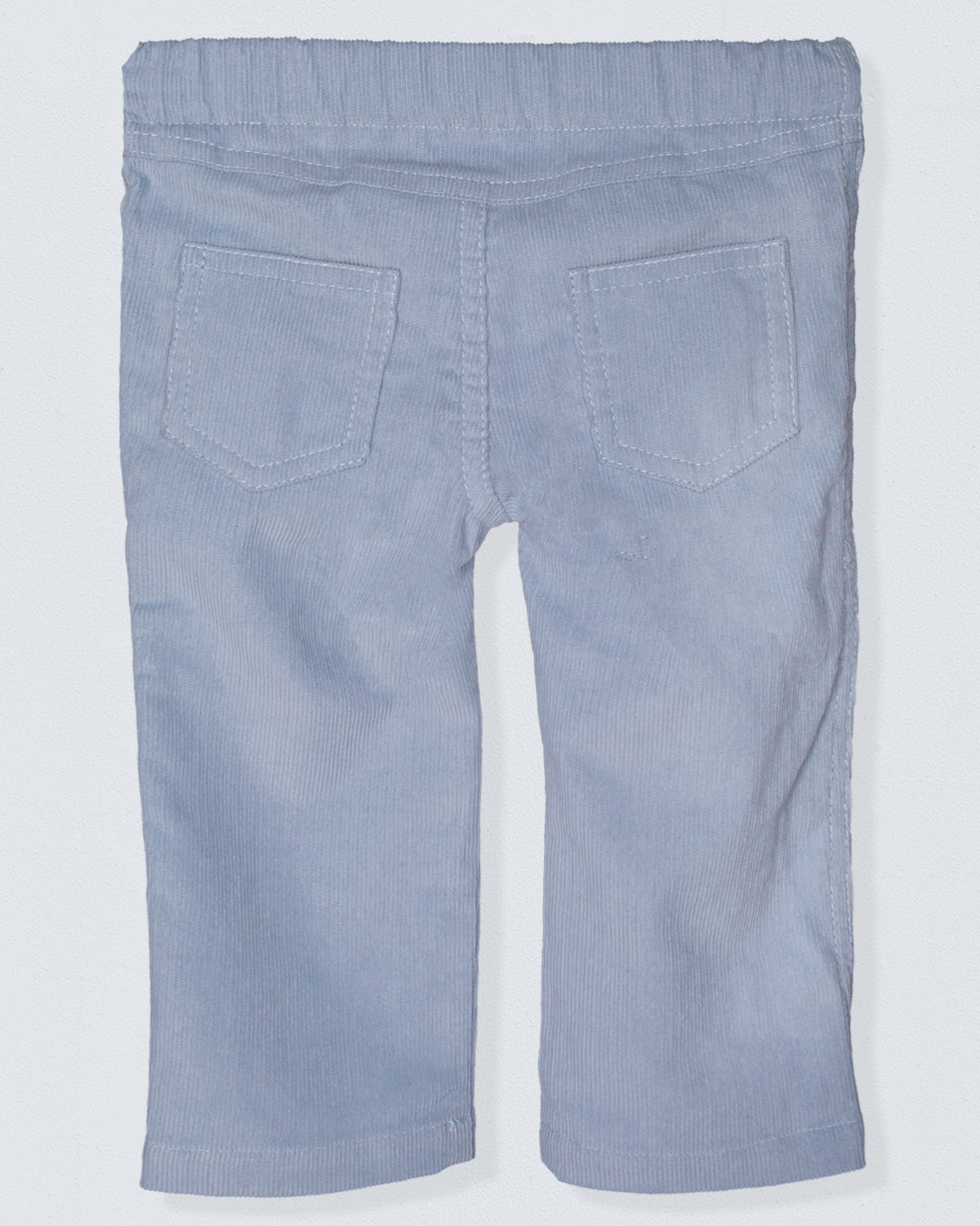 Back view of light blue corduroy pants with an elastic waistband and two patch pockets, made from soft, fine Italian corduroy.