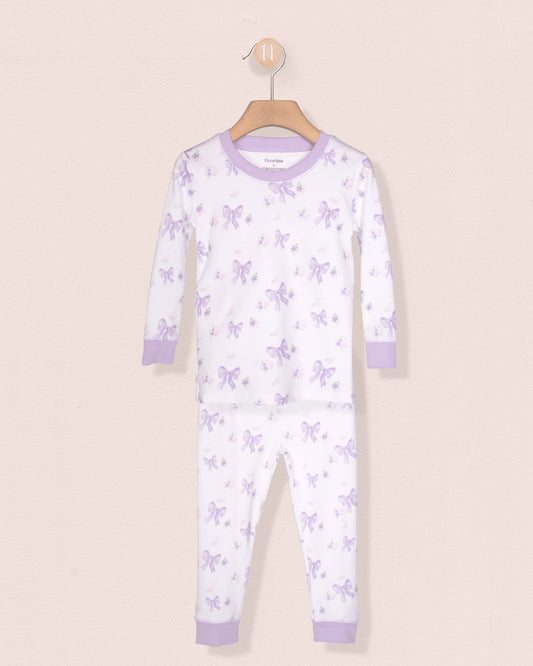 Children's pajama set with butterfly pattern on a white background