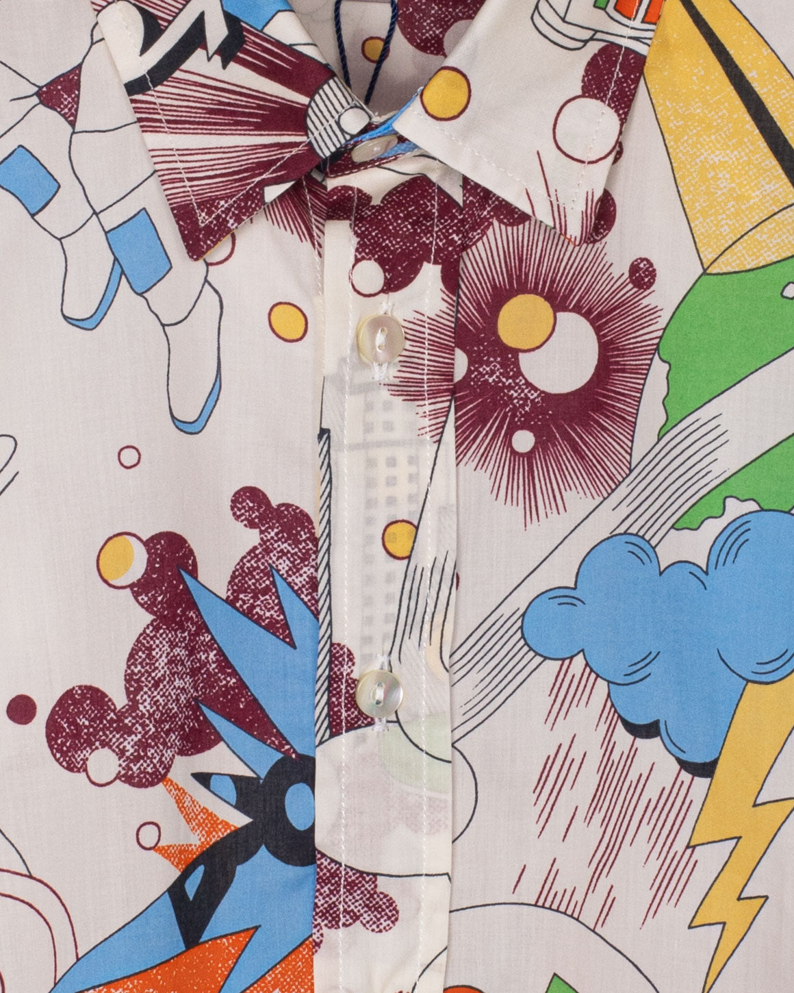 Close-up of the Bernard Liberty shirt's collar and buttons, highlighting the detailed robot and space-themed Liberty print.