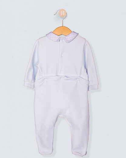 Back view of the light blue Italian velour footie with checkered collar and back snap closures, highlighting the smooth velour texture and soft tailoring.