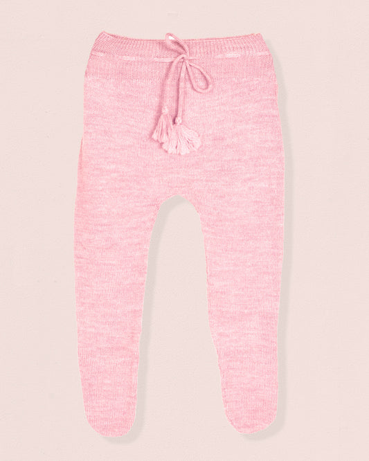 Pink knit pants on a light pink background