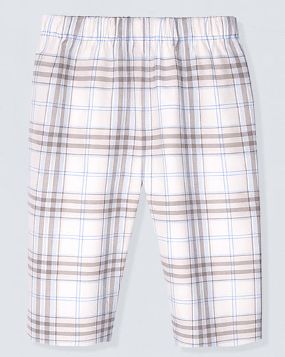 Plaid shorts with a brown and white pattern on a light gray background