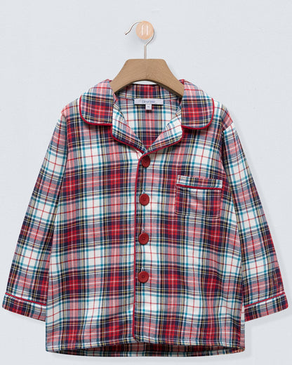 Plaid shirt on a hanger against a light gray background