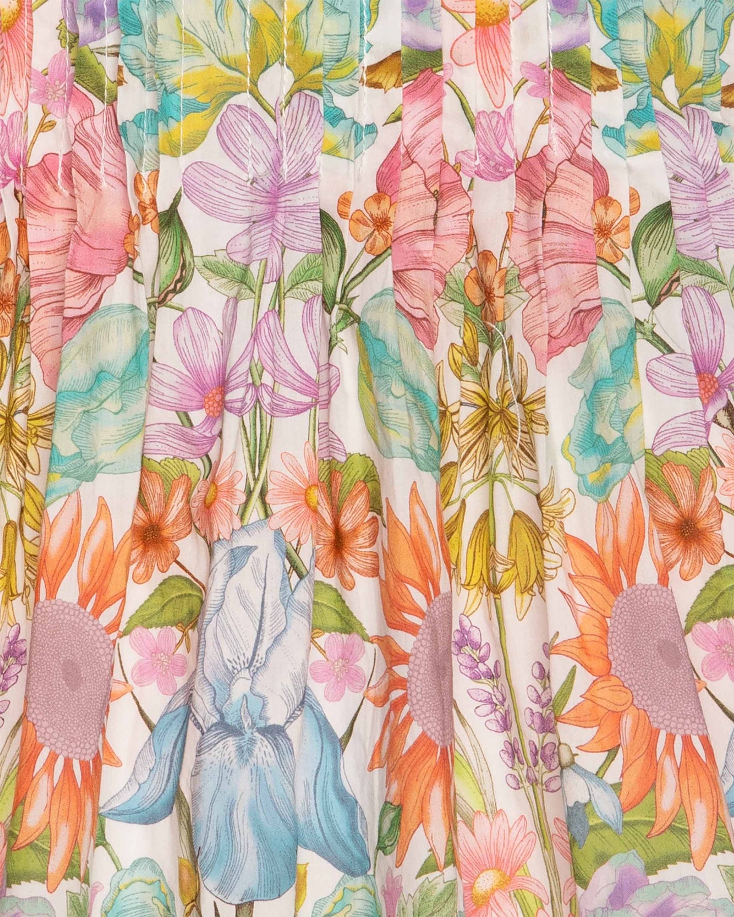 Colorful floral fabric pattern with various flowers on a white background