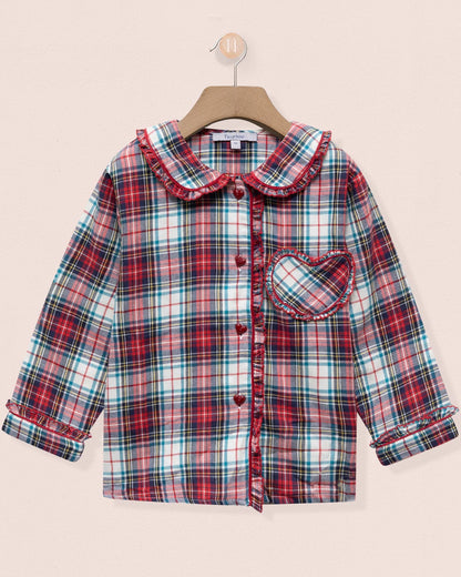 Plaid shirt with a collar on a beige background