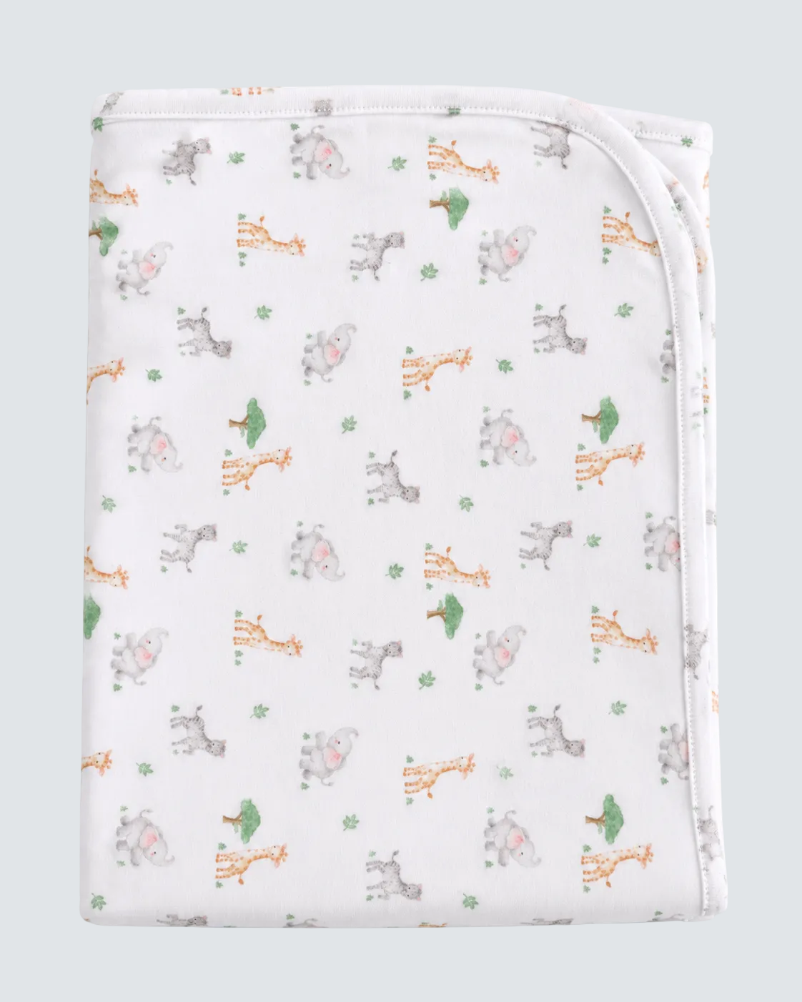 A folded white baby blanket featuring a cute animal print of giraffes, hippos, and elephants in soft pastel colors, set against a light blue background.