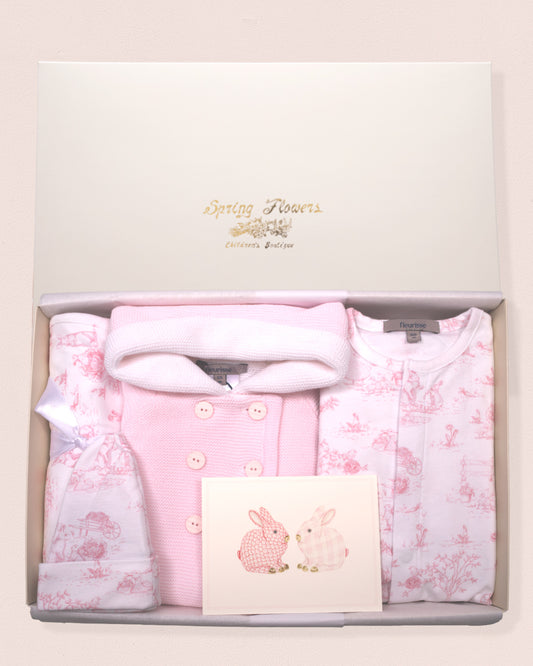 Baby clothing set with floral patterns in a branded gift box