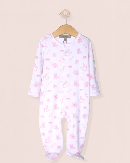 Baby onesie with pink floral pattern on a beige background