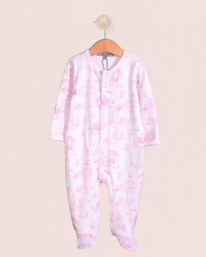 Pink floral baby onesie on a hanger against a beige background
