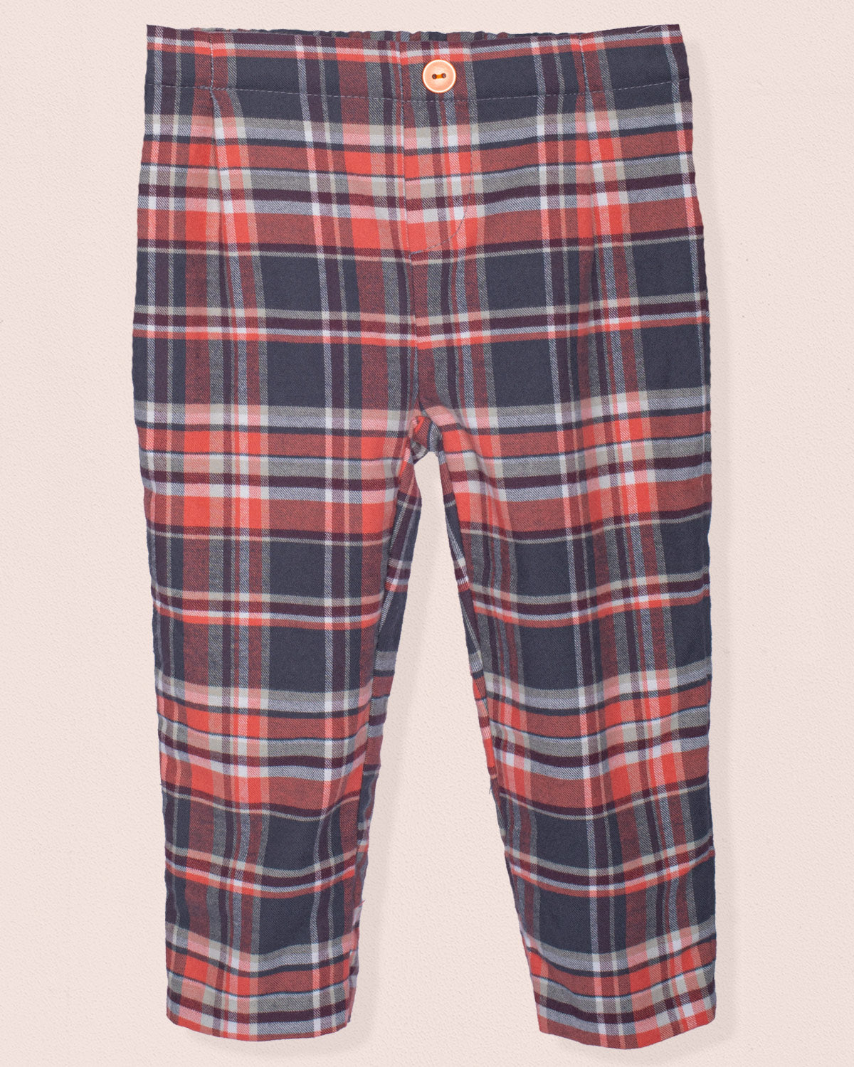 Front of pants with red, deep brown, and white pattern on a light pink background