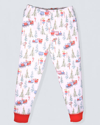 Children's pajama pants with Christmas tree and train pattern on a light gray background