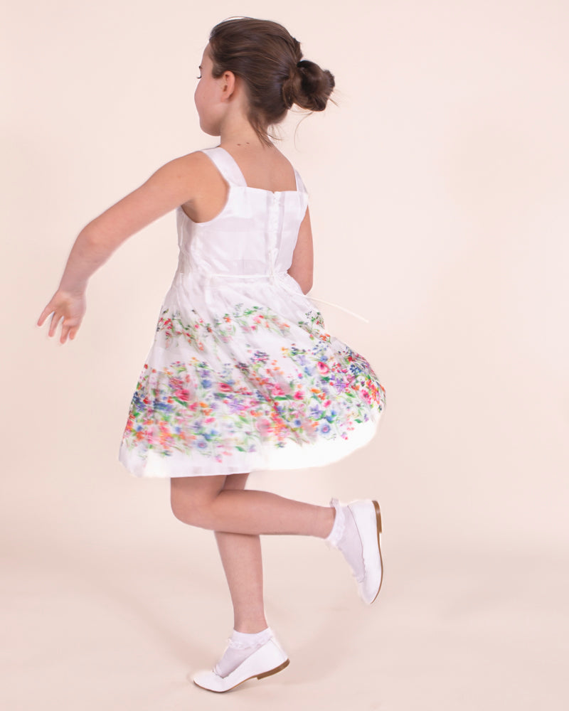 girl twirling in dress and shoes