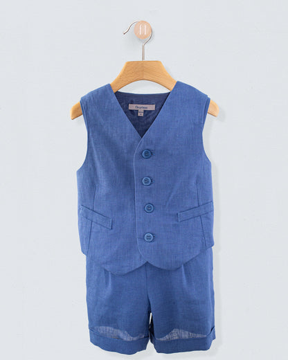 Front view of Prince Harry 2-piece set with blue linen suspender shorts and matching vest, hanging on a wooden hanger