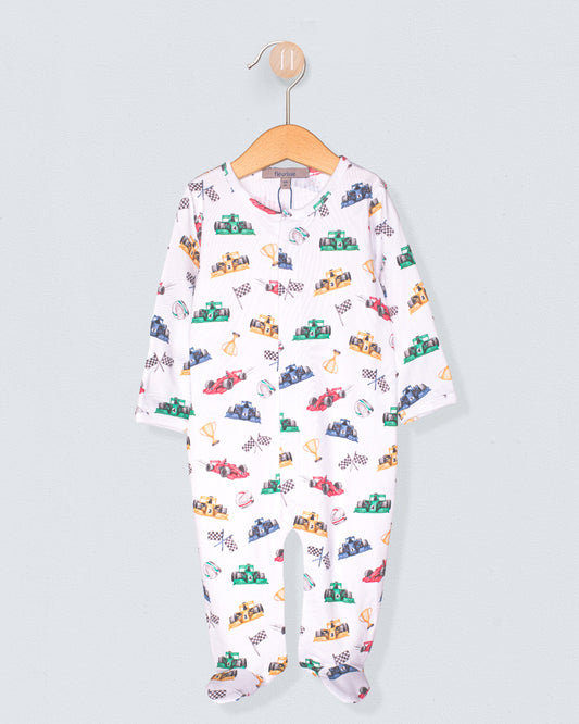 Baby onesie with car pattern on a hanger against a light gray background