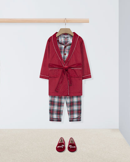 Red robe with plaid shirt and pants on a hanger, accompanied by red shoes on a white background.