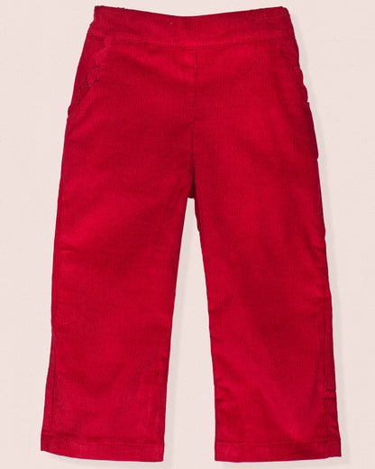 Front view of ruby burgundy Italian corduroy pull-on pants with scalloped front pocket detailing.