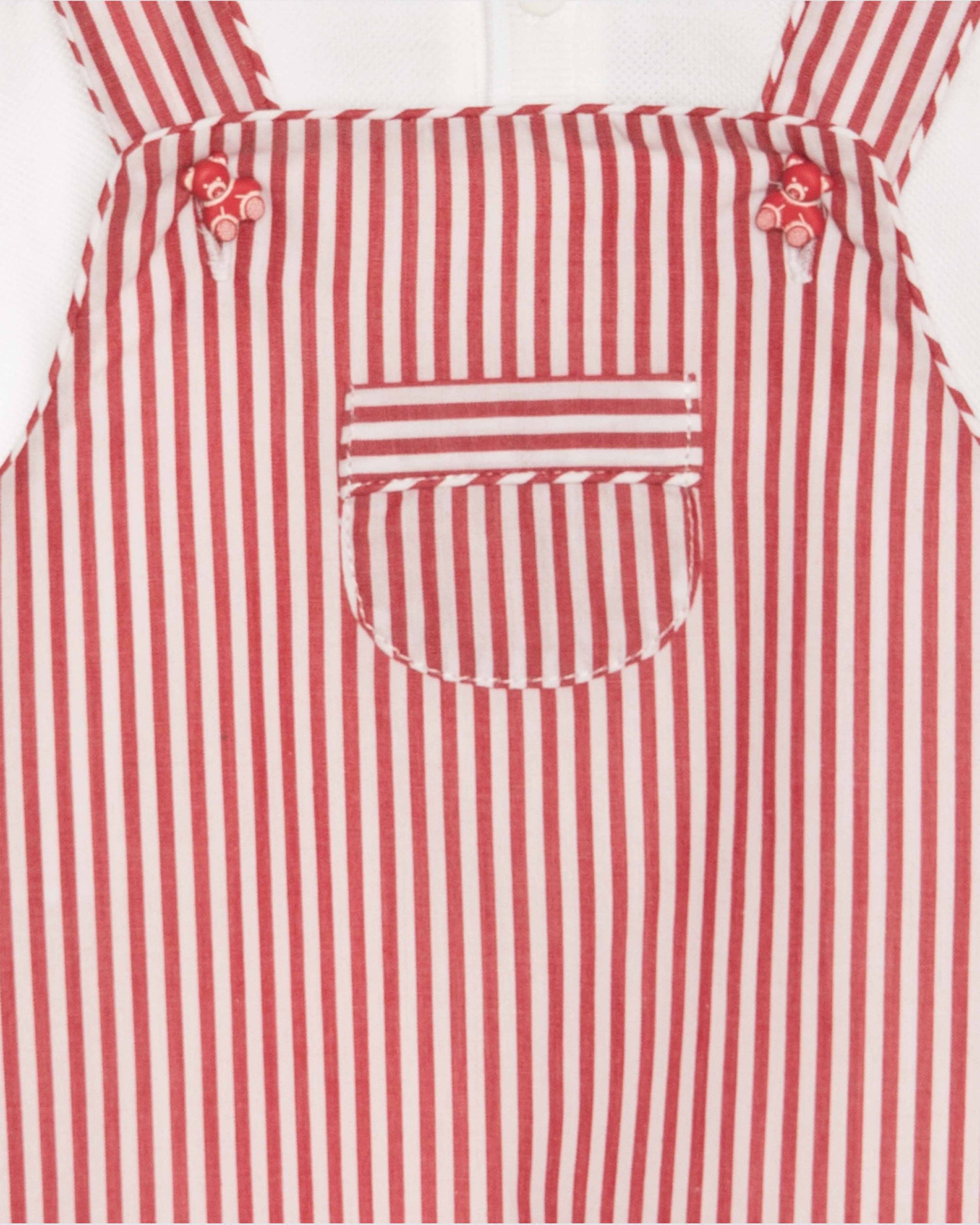 close up Red and white striped shortall with a pocket on a white background