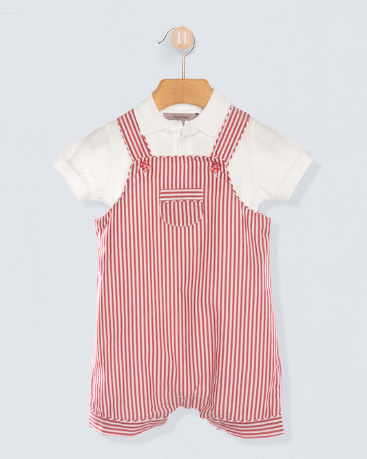 Red and white striped shortall with a white shirt on a light gray background