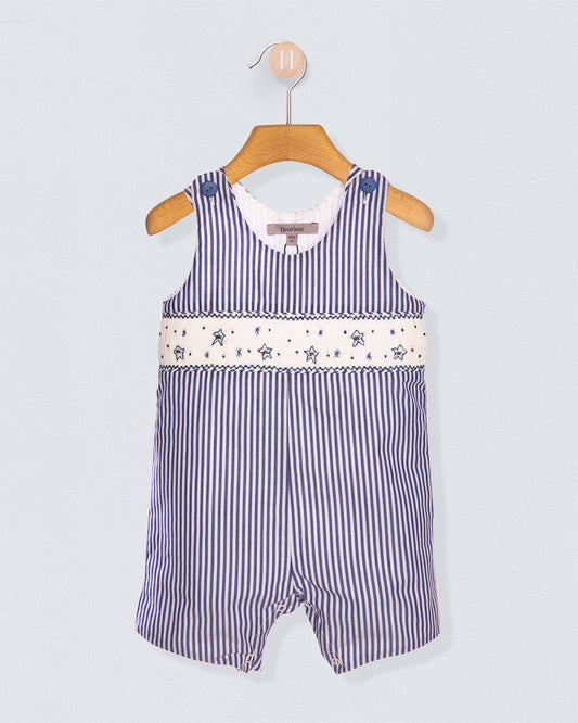 Children's navy and white striped romper on a hanger against a light gray background